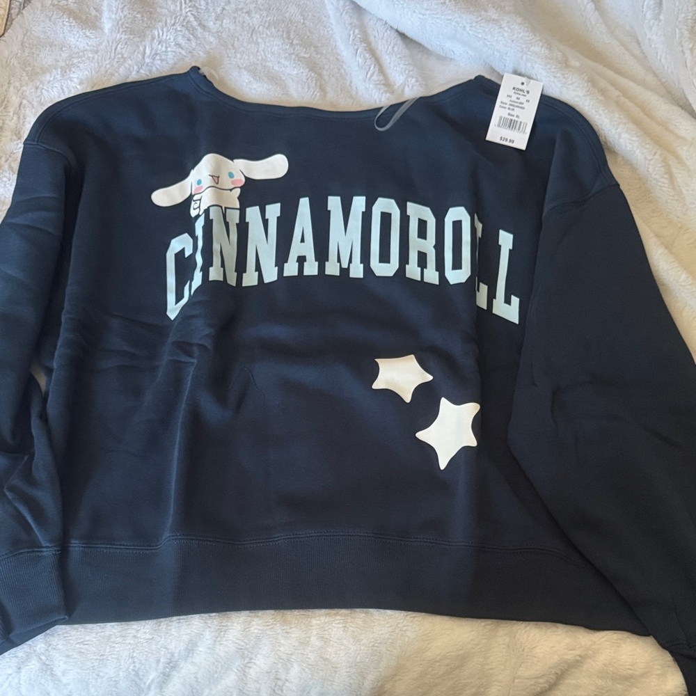 Sanrio Cinnamoroll Off-Shoulder Sweater in Navy with White Accents